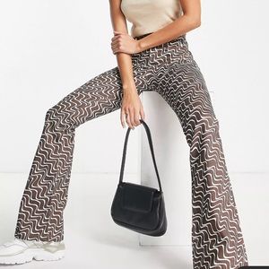ASOS DESIGN puddle flare pants in chocolate wavy print